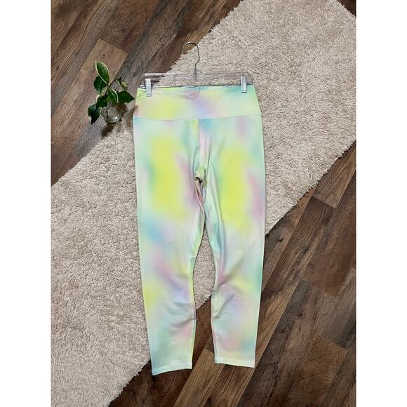 Fabletics Tie Dye Blur/Lemon Creme Boost Powerhold High Waisted 7/8 Leggings - Picture 3 of 9